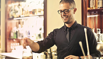 bartender with tequila cultura 100